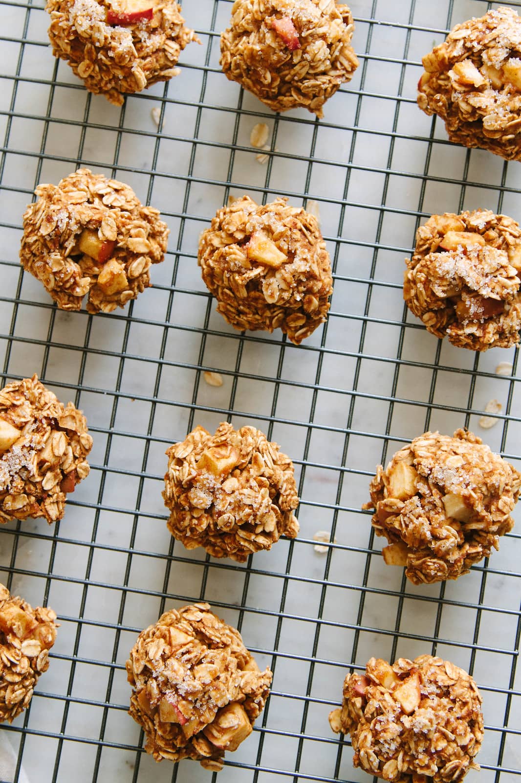 top down view of healthy apple oatmeal cooling on a wire rack. cookies