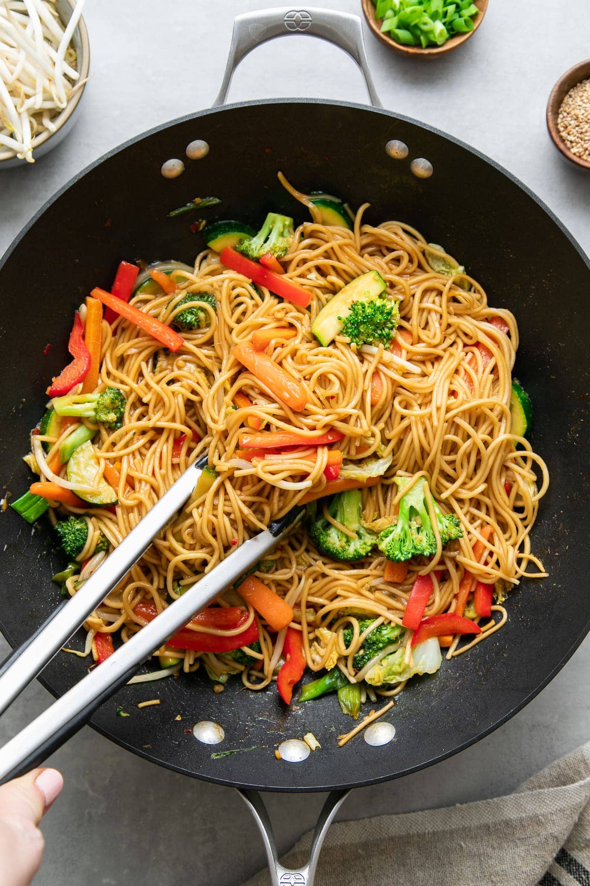 top down view of ramen noodle stir fry in a wok.
