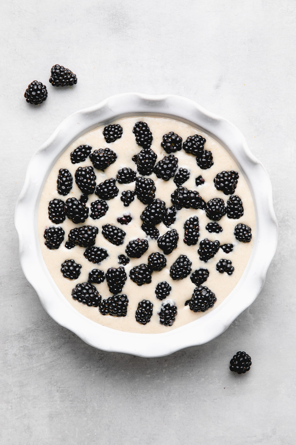 top down view of southern blackberry cobbler ready for the oven.