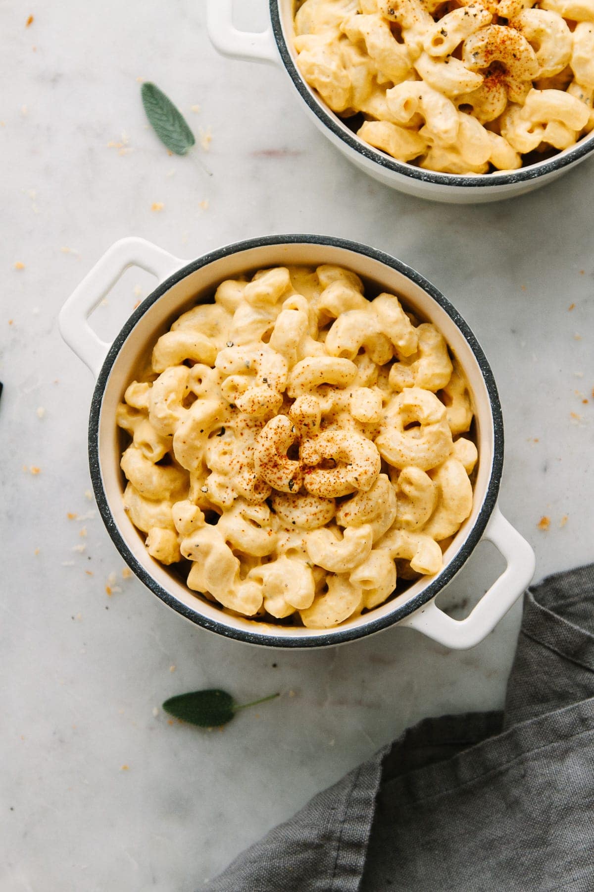 top down view of vegan butternut squash mac and cheese in a mini casserole.