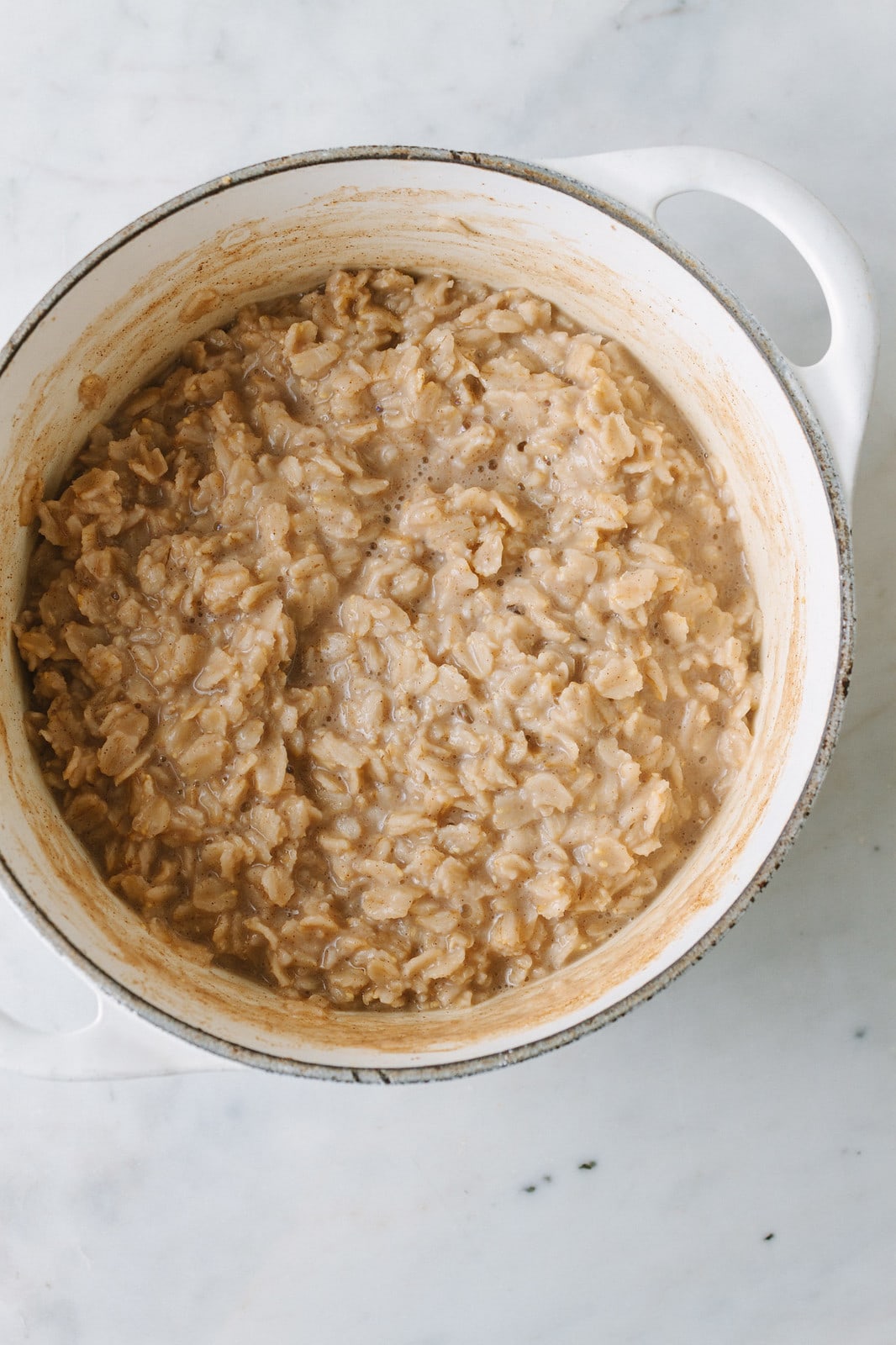 top down view of freshly made pot of healthy cinnamon oatmeal.