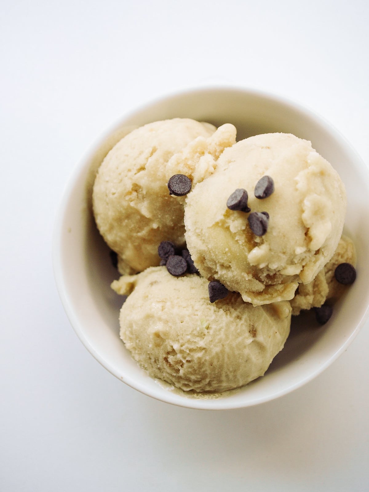 top down view of bowl with serving of coconut banana ice cream.