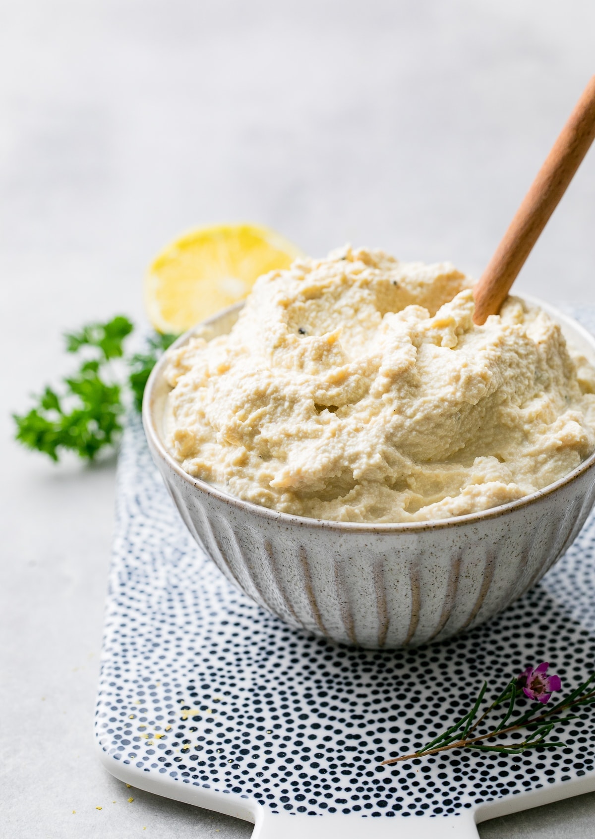 side angle view of a bowl full of healthy vegan tofu ricotta.