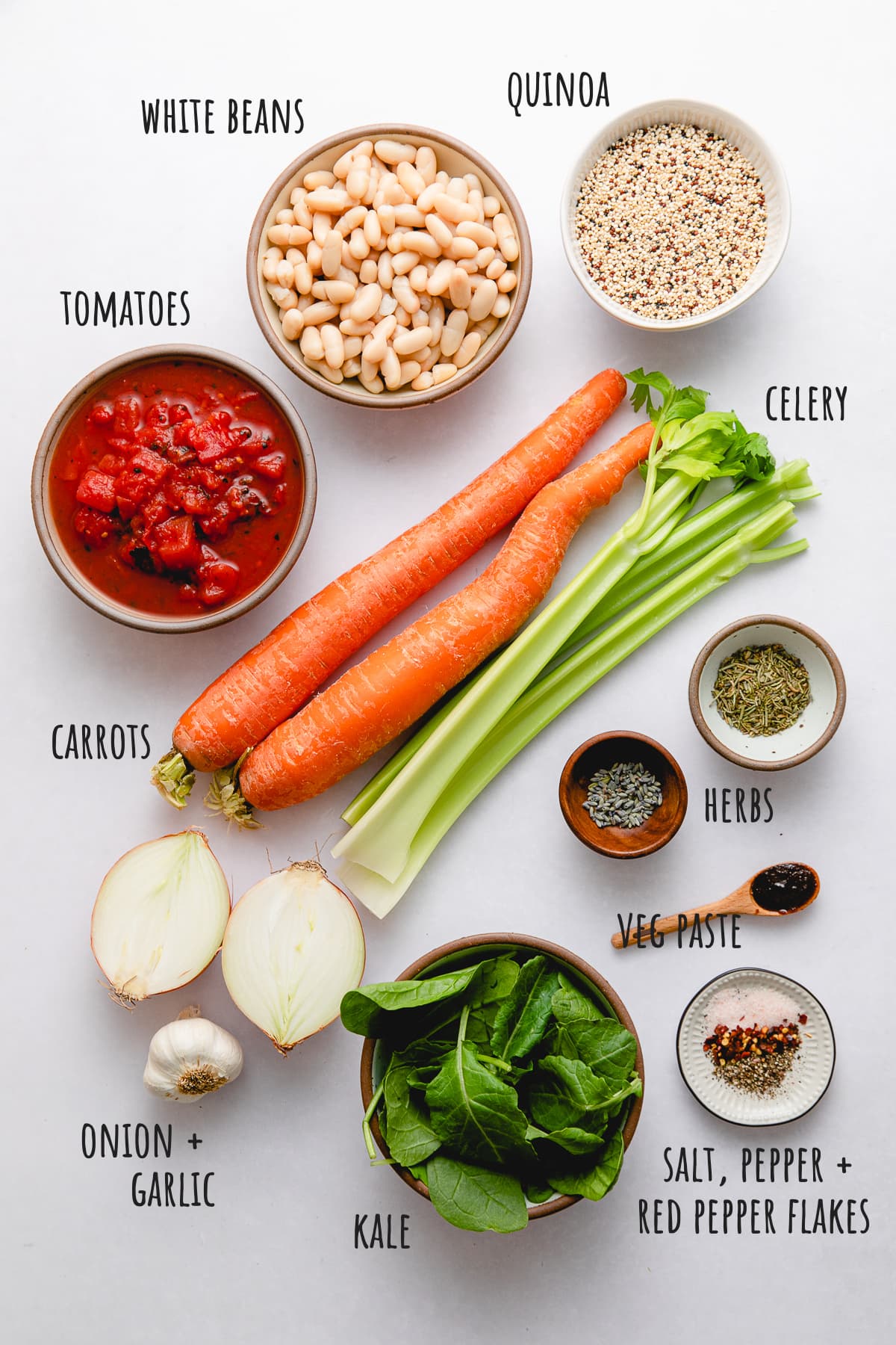 top down view of ingredients used to make kale, quinoa white bean soup.